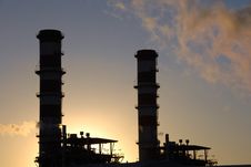 Industrial Complex Plant At Sunset Stock Photo