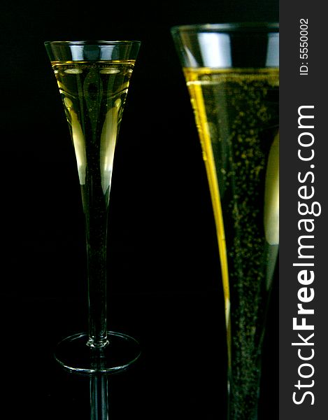 Sparkling wine isolated against a black background