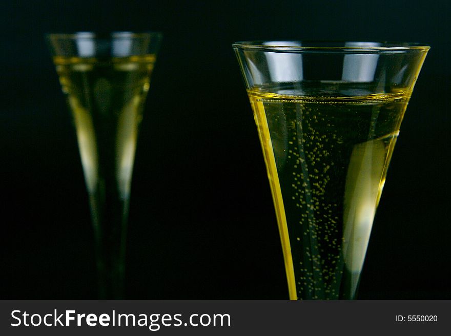 Sparkling wine isolated against a black background