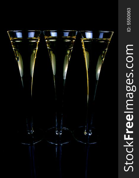 Sparkling wine isolated against a black background