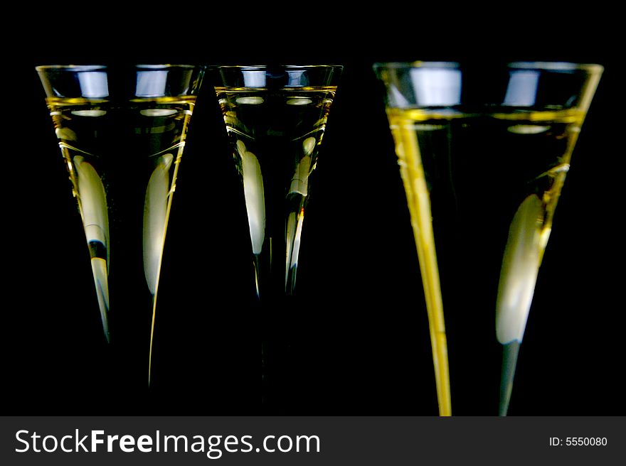 Sparkling wine isolated against a black background