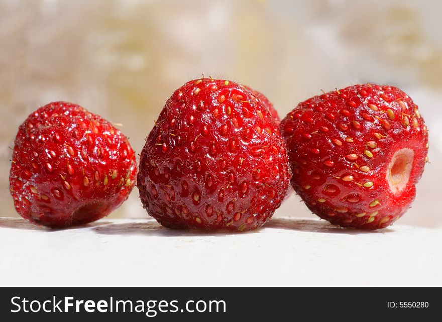 Strawberries against similar to whipped cream (yoghurt).