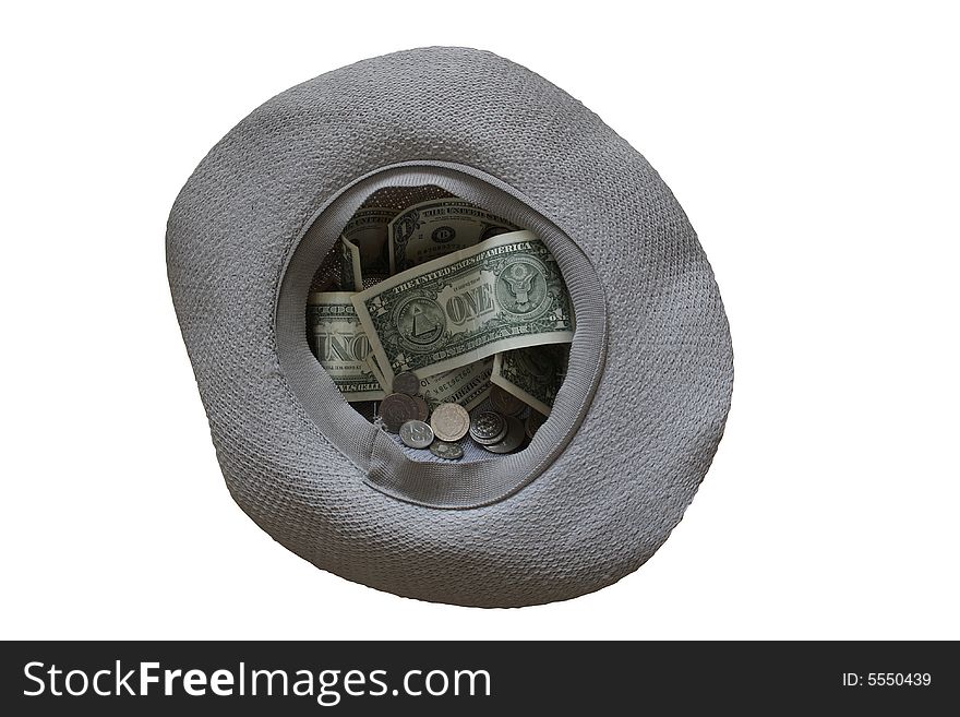 Beggar's hat with money lying on white background. Beggar's hat with money lying on white background