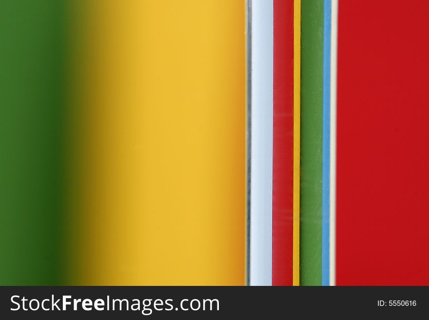 A glass with a simple  green - yellow - red color background. A glass with a simple  green - yellow - red color background