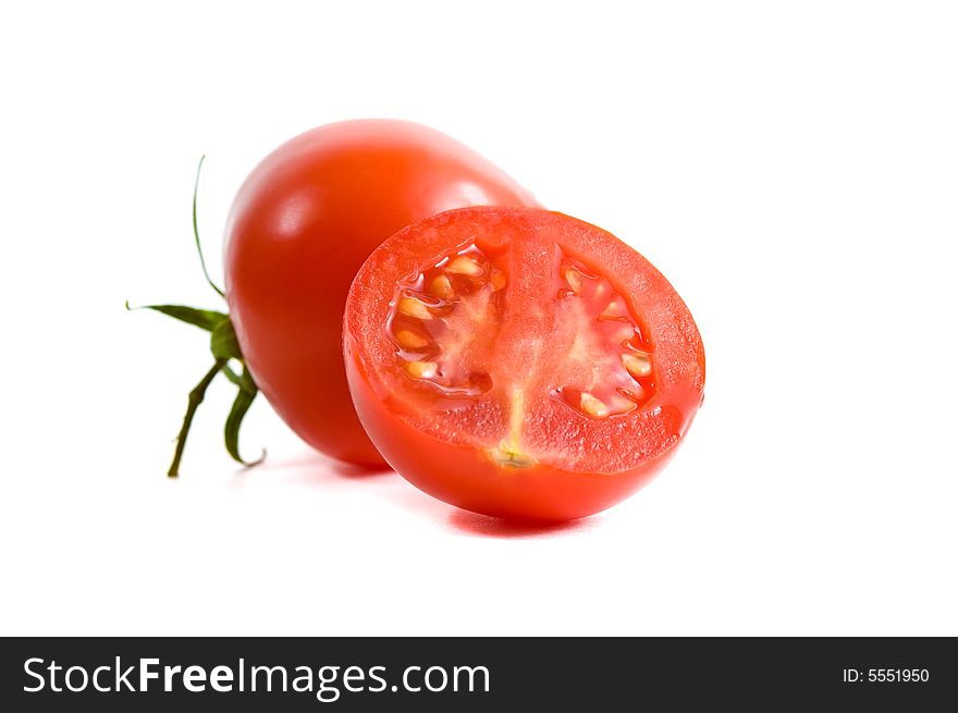 Tomato close-up isolated on white. Tomato close-up isolated on white