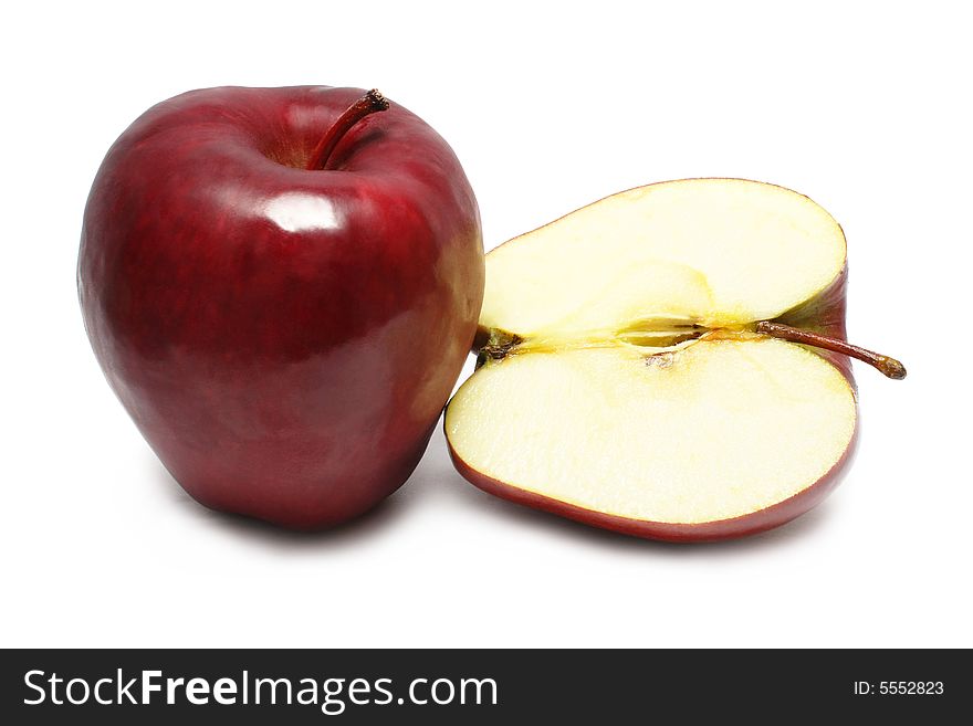 One and half apple on white background. One and half apple on white background.