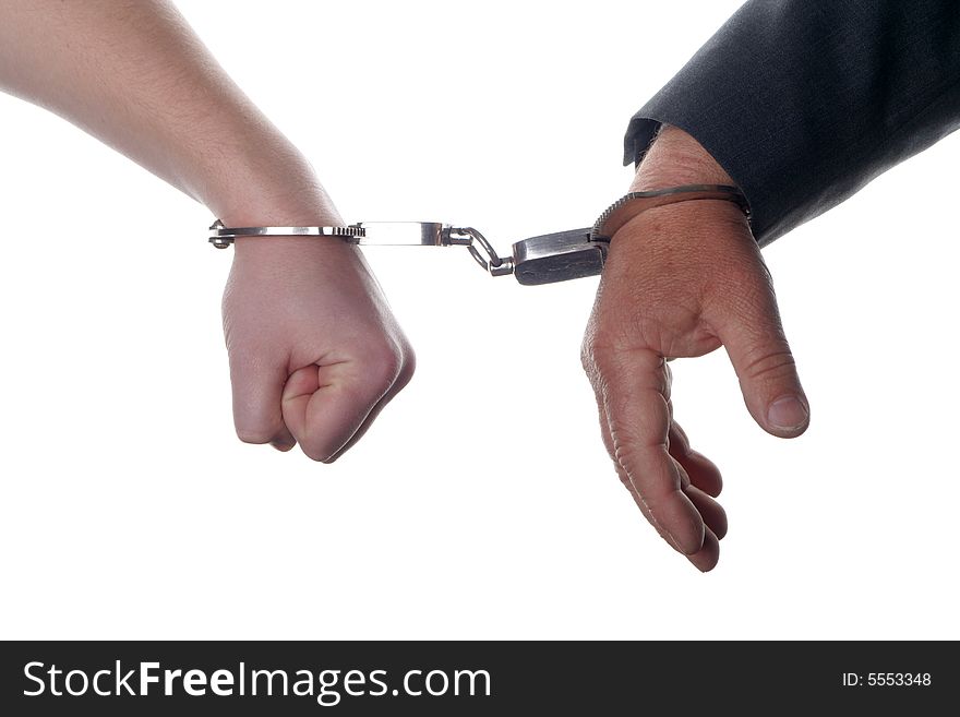 Two people chained together with white background. Two people chained together with white background