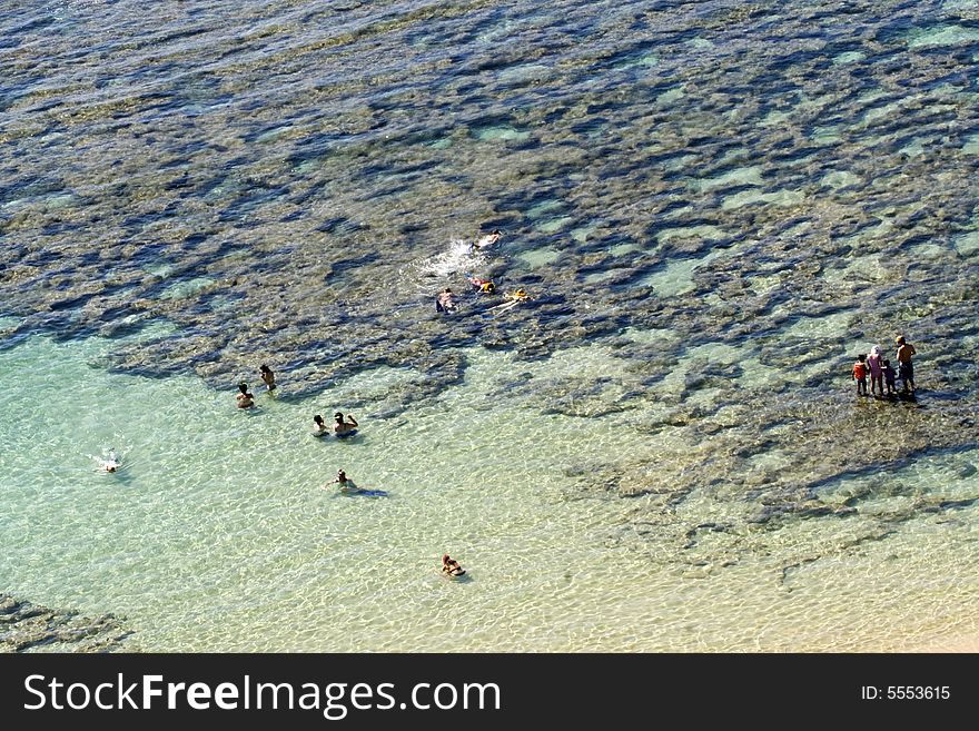 Lagoon, Sand and swimming people. Lagoon, Sand and swimming people