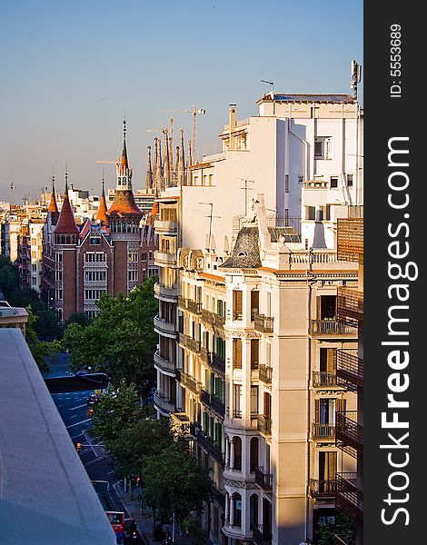 Streets of Barcelona, Spain with Sagrada Familia temple in the background