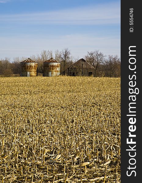Vertical image of silos and barn. Vertical image of silos and barn