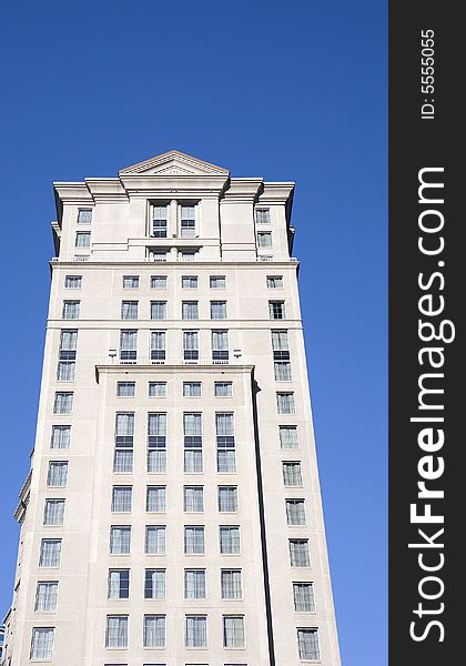 A traditional high rise concrete office tower. A traditional high rise concrete office tower