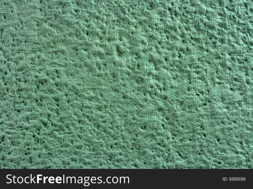 Green moonrock paper texture, close-up