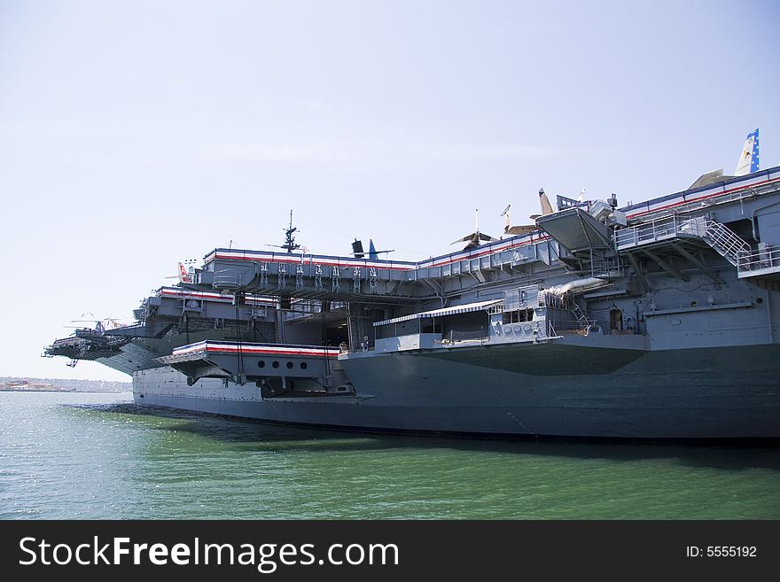 A US aircraft carrier in port at San Diego
