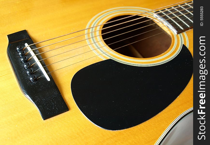 A close up of a classic guitar. A close up of a classic guitar.