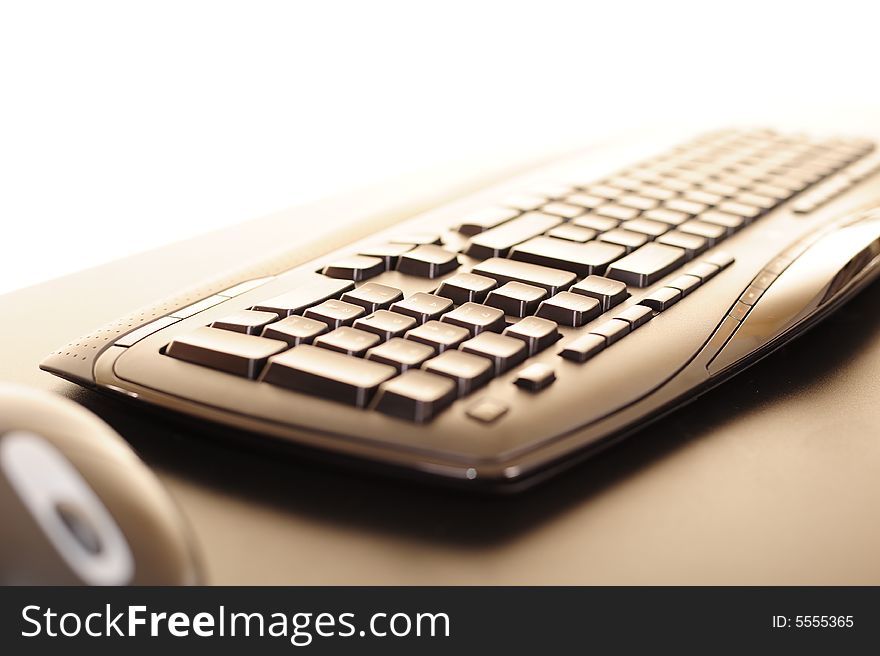 Abstract of a computer keyboard and mouse with slight burnout on top, suitable for background image or conceptual design. Abstract of a computer keyboard and mouse with slight burnout on top, suitable for background image or conceptual design.