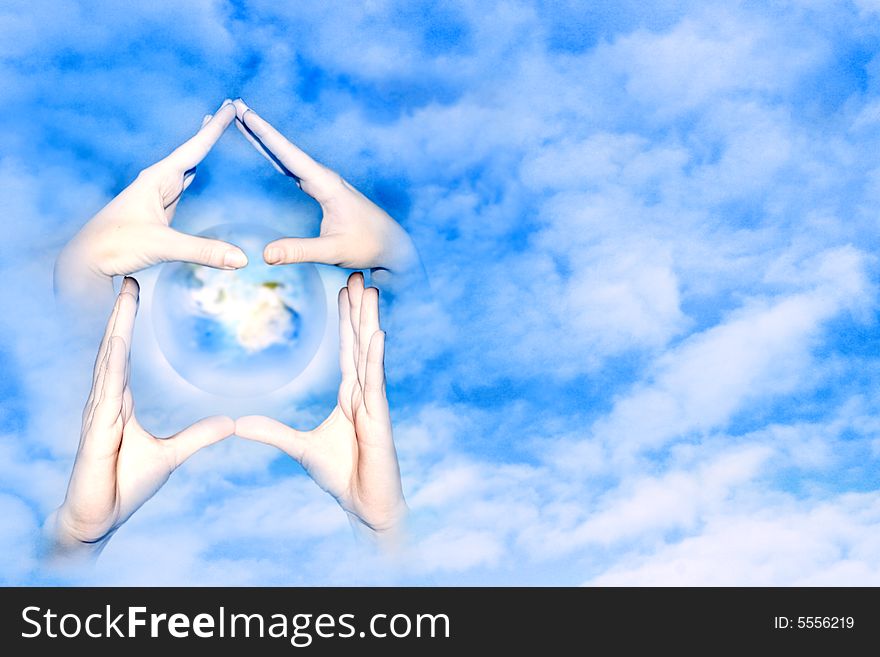 Hands of the person forming form house on background sky and cloud
