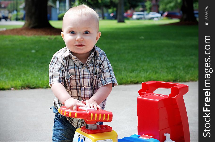 Baby Playing With Toy Truck - horizontal