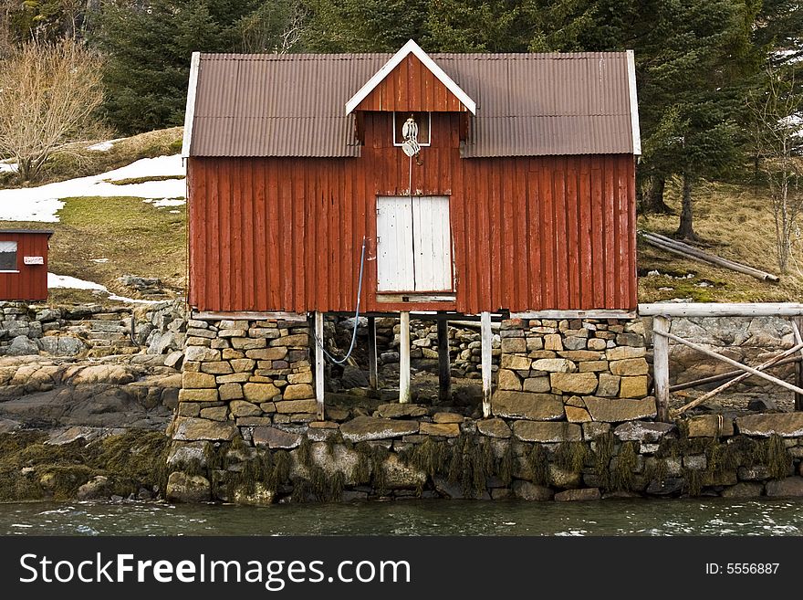 Red house at the sea