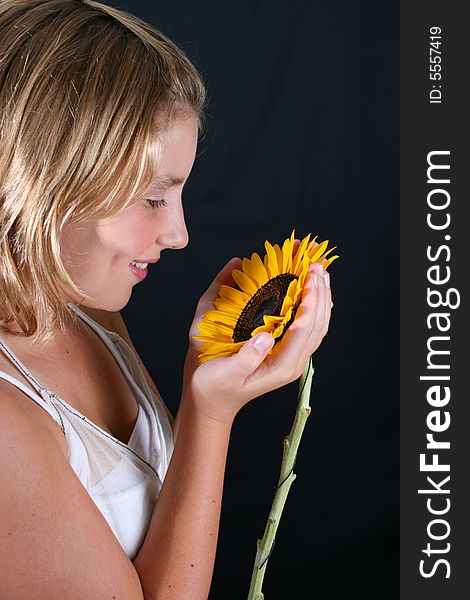 Teenage female model on a black background. Teenage female model on a black background