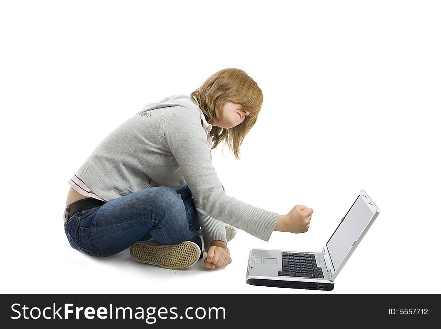 The young girl with the laptop isolated on a white background