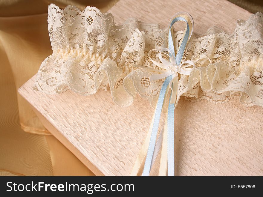 Cream Colored Jewellery box and bridal garter. Cream Colored Jewellery box and bridal garter