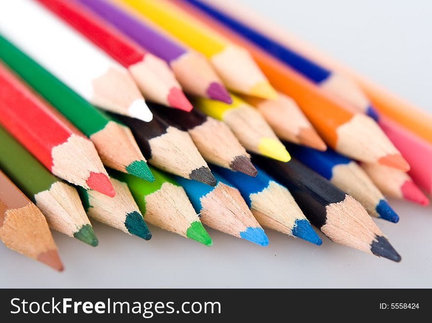 Close up of color pencils, isolated on white