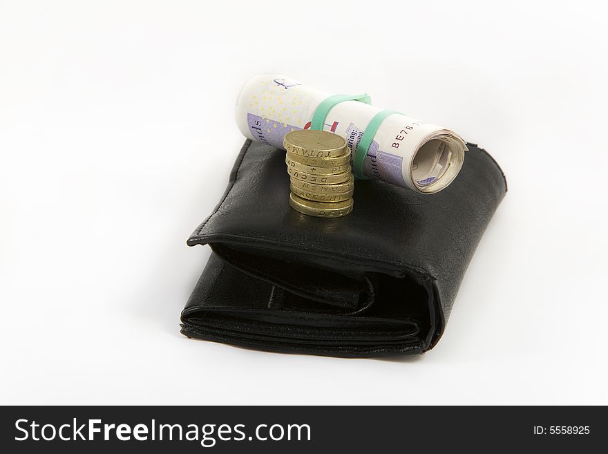 Black wallet with english pounds isolated on white bacground