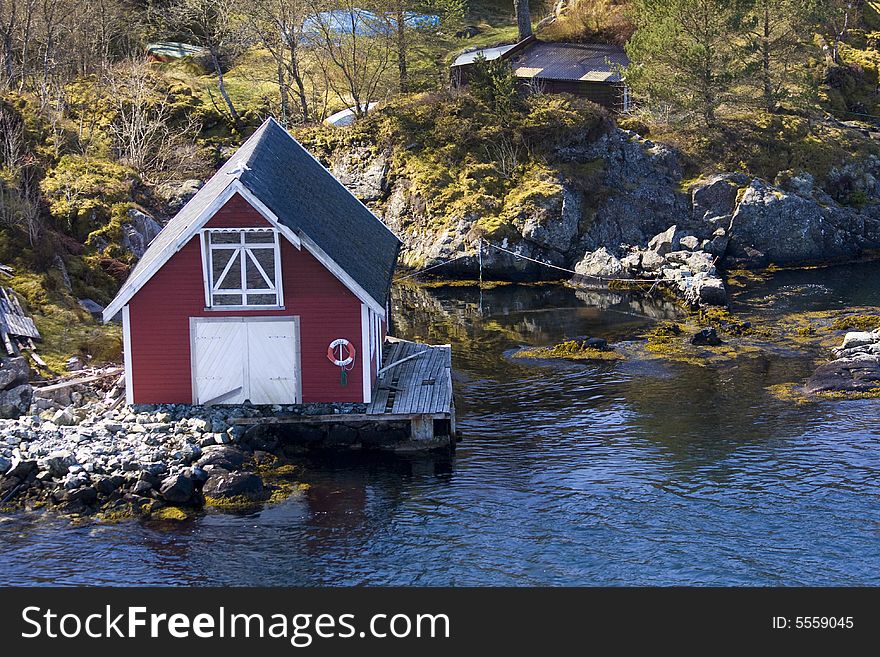 Red house at the sea