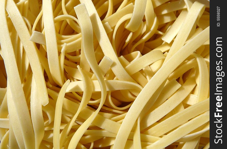 A close up photo of a set of stir fry noodles. A close up photo of a set of stir fry noodles.