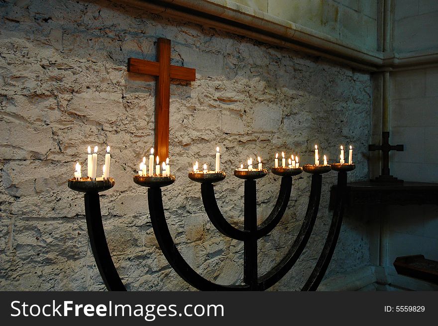 A row of candles at the church altar (religion theme)