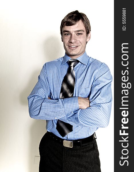 A male model photographed in the studio.