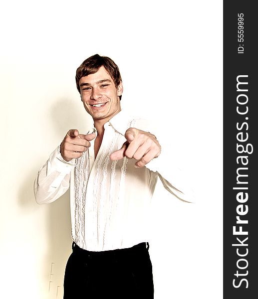 A male model photographed in the studio.