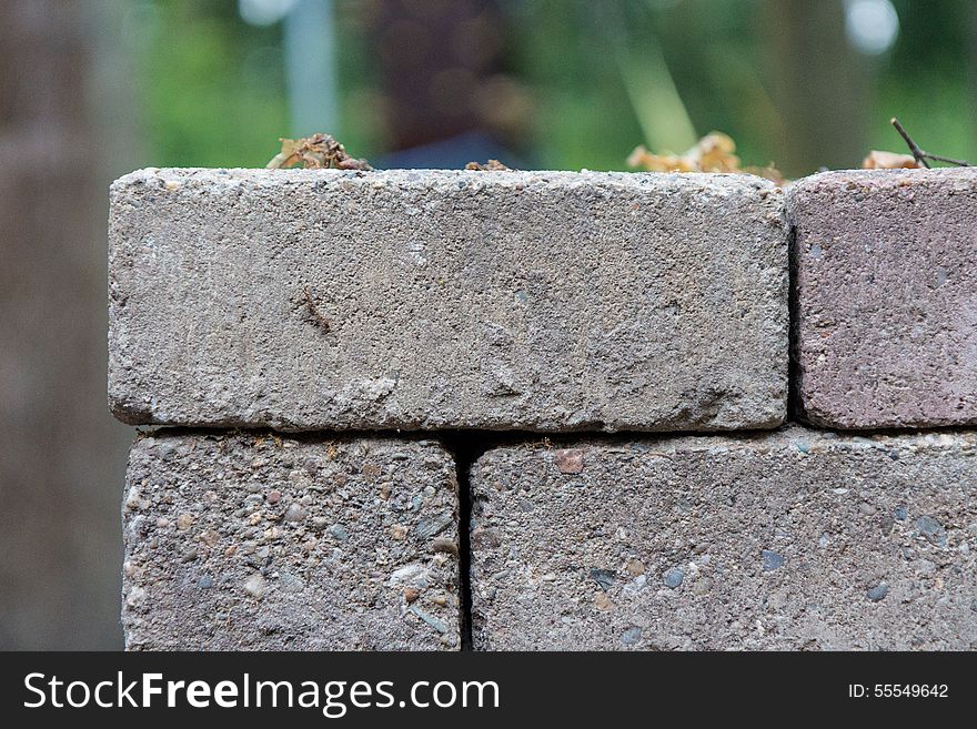 This brick is part of a pile.