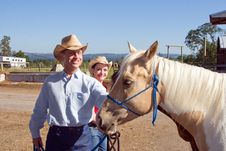 Cowboy, Cowgirl, And Horse - Horizontal Stock Photos