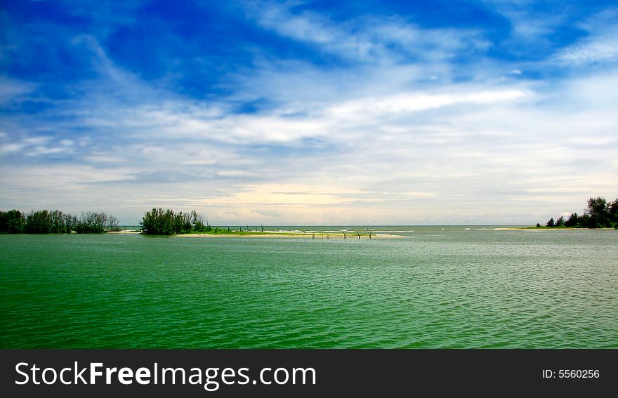 Island beach with blue sky. Island beach with blue sky