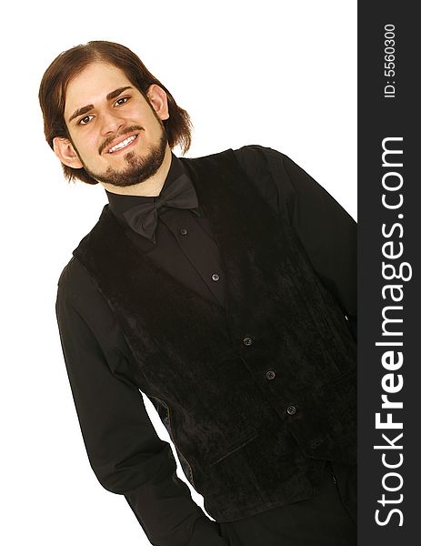 Happy young man in black vest and bow tie ready to party