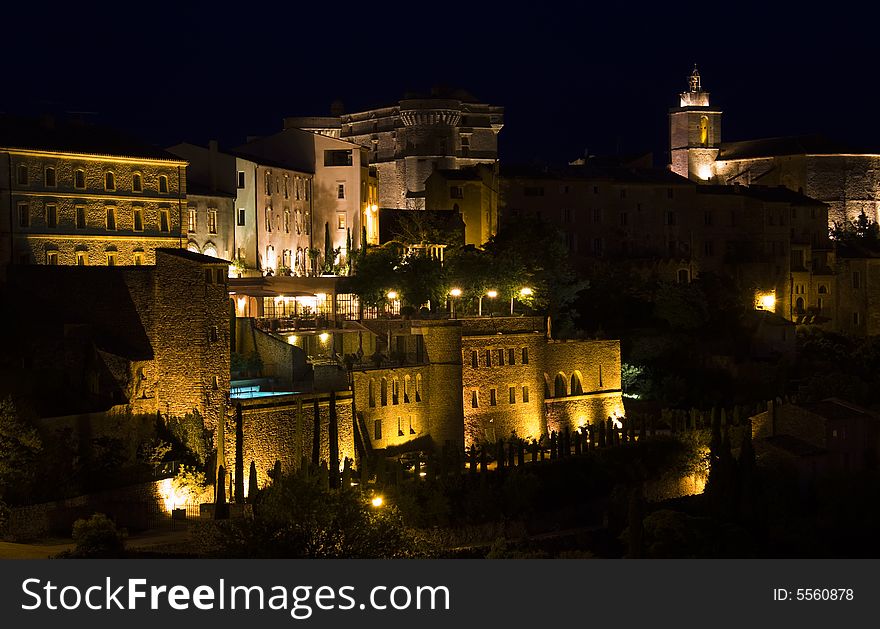 The historic hilltop town of Gordes, lit at night. The historic hilltop town of Gordes, lit at night.