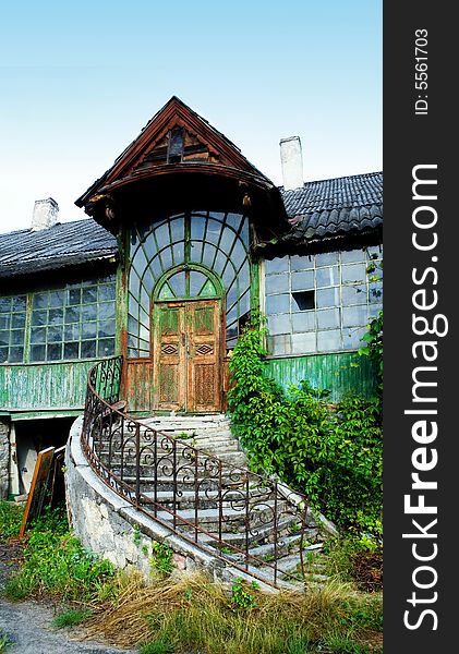 An image of old house with stairway