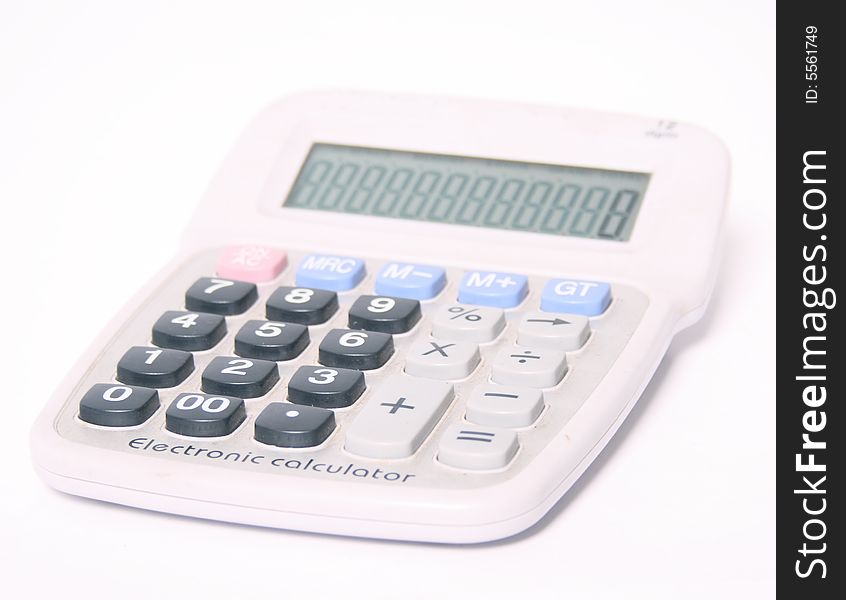 A small,white electronic calculator.