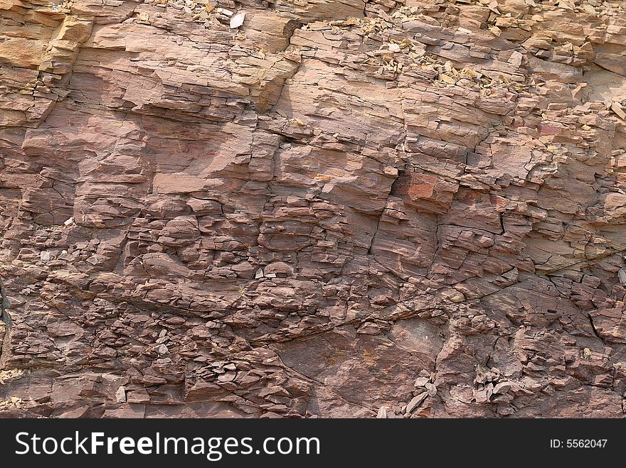 Isolated red rock wall texture. Isolated red rock wall texture