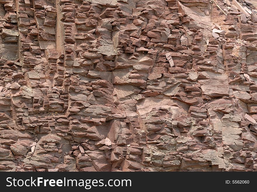 Isolated red rock wall texture. Isolated red rock wall texture