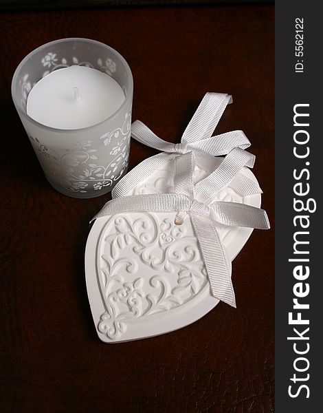 White Ceramic hearts with candle in glass