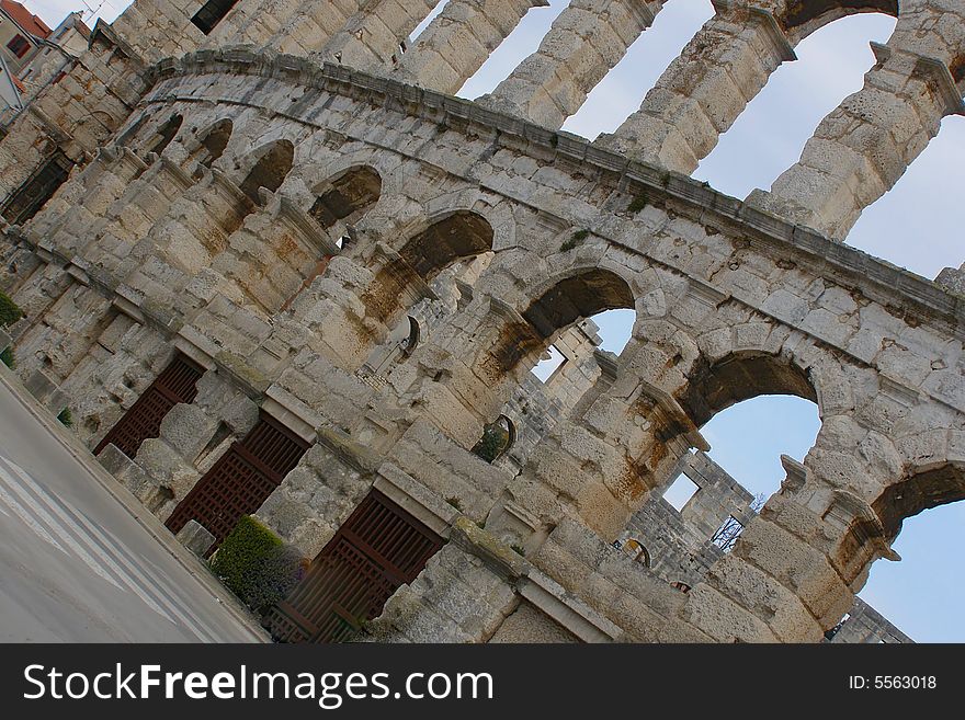 Pula (Croatia) postcard: Roman amphitheatre Arena; sightseeing attraction and venue for various events such as concerts, gladiator games performances, etc. Pula (Croatia) postcard: Roman amphitheatre Arena; sightseeing attraction and venue for various events such as concerts, gladiator games performances, etc.