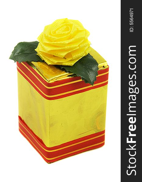 Blue gift witch yellow rose isolated on white background. See more in my portfolio. Blue gift witch yellow rose isolated on white background. See more in my portfolio.