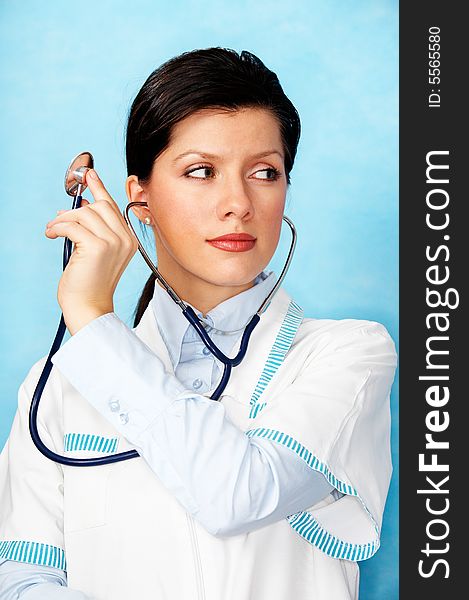 Young beautiful caucasian doctor with stethoscope