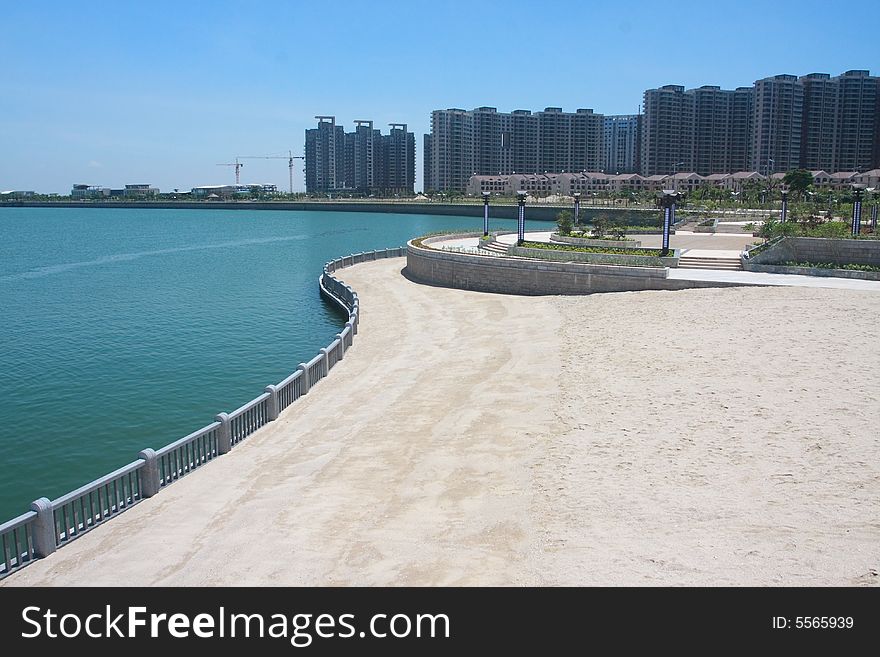 Coast with White railing and sand. Coast with White railing and sand