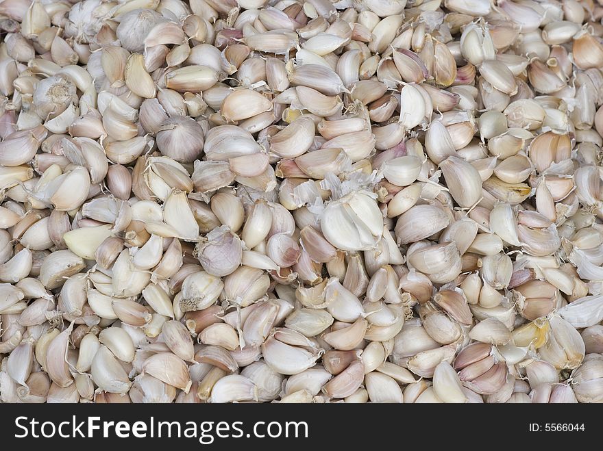 Garlic cloves in a market, background abstract