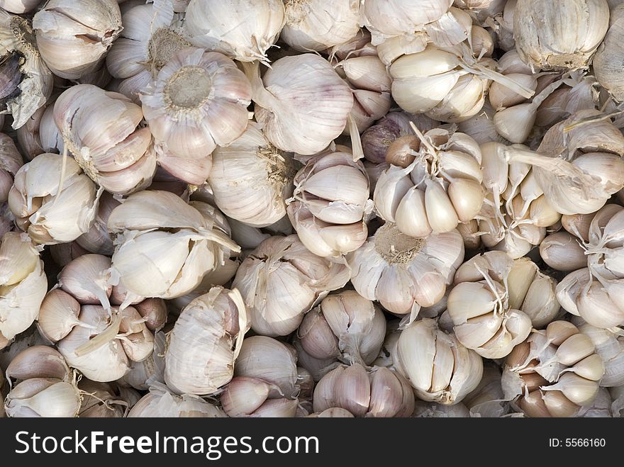 Garlic at a market, background abstract.