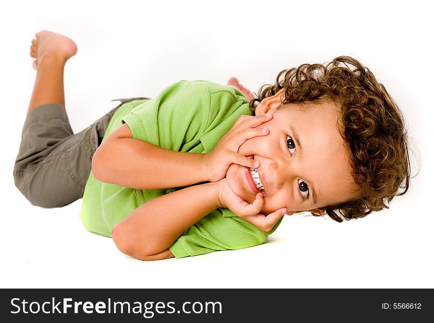 A cute young boy on white background