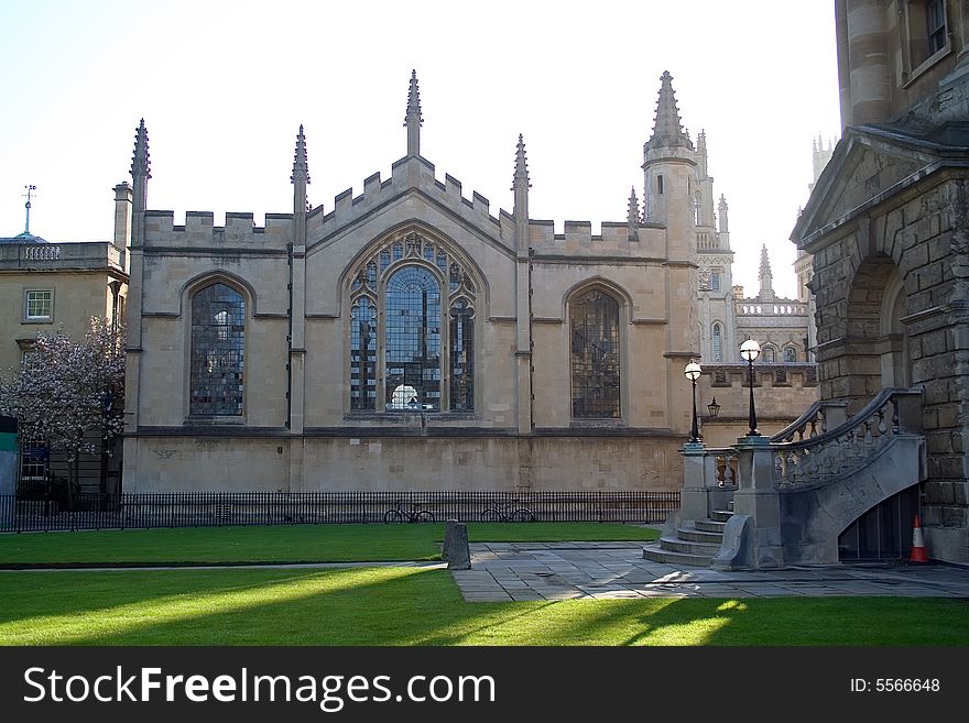 All Souls College Oxford with Radcliffe Camera entrance on the right. All Souls College Oxford with Radcliffe Camera entrance on the right